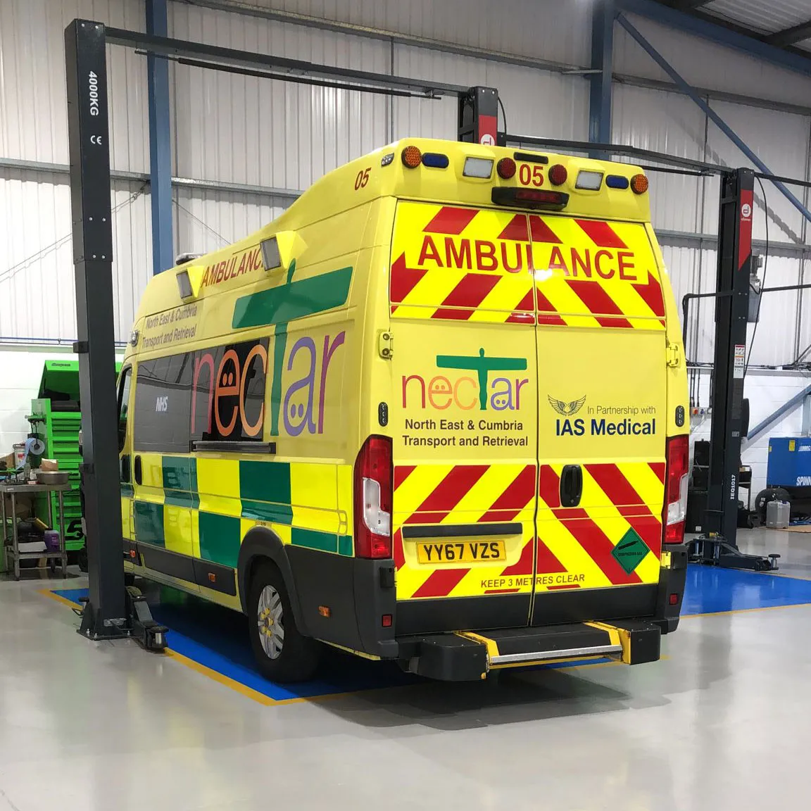 West Auto technician working on an emergency vehicle in Newcastle