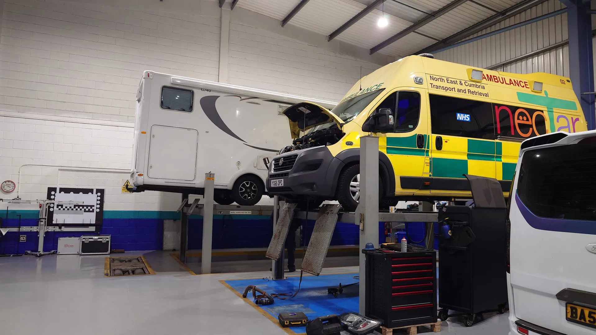 West Auto technician working on an emergency vehicle in Newcastle